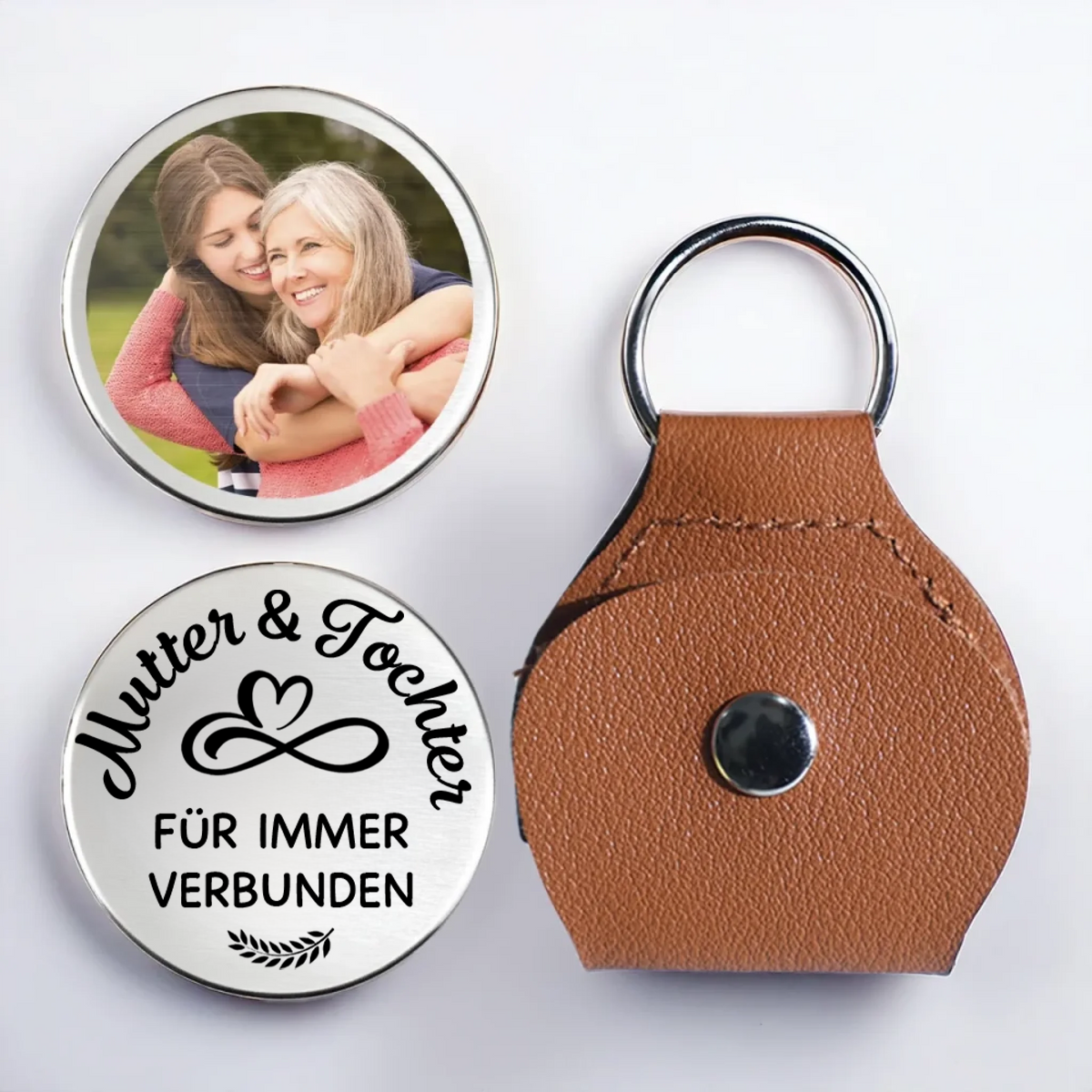 Mutter und Tochter-Taschenumarmung mit Foto